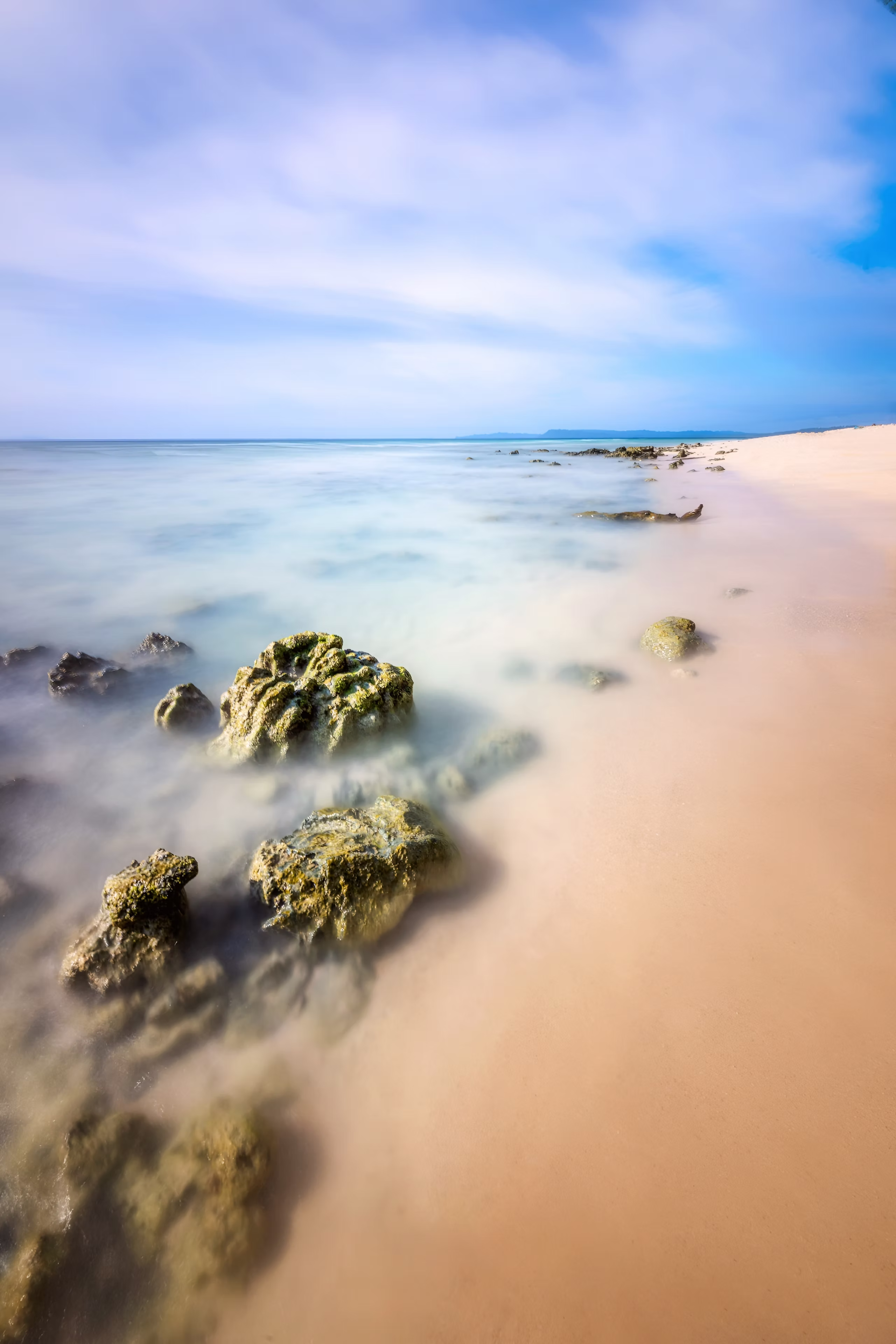Turquoise Andaman shoreline and coral rocks